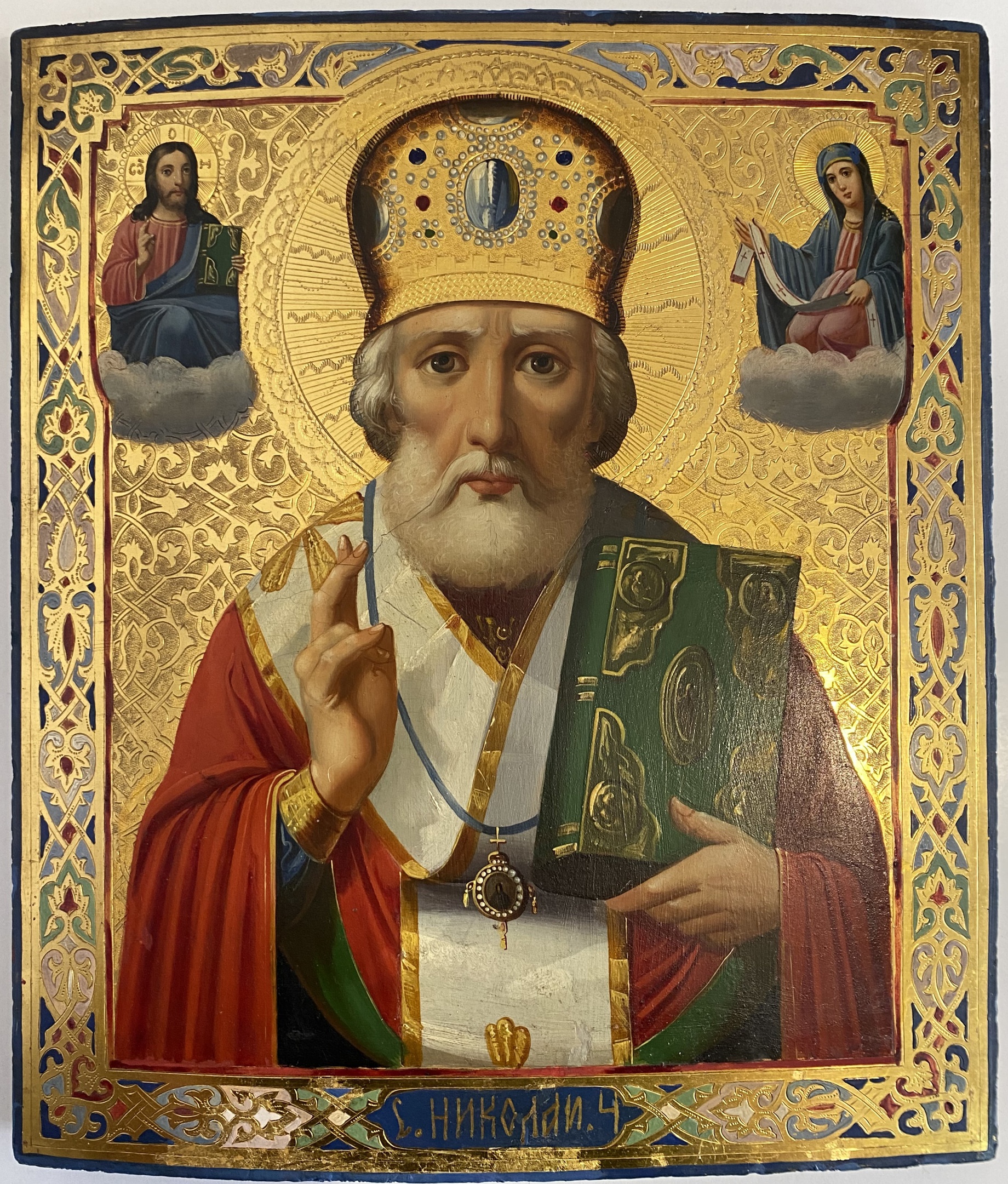 Антикварная старинная икона Николай Чудотворец по золоту с чеканкой 19 век