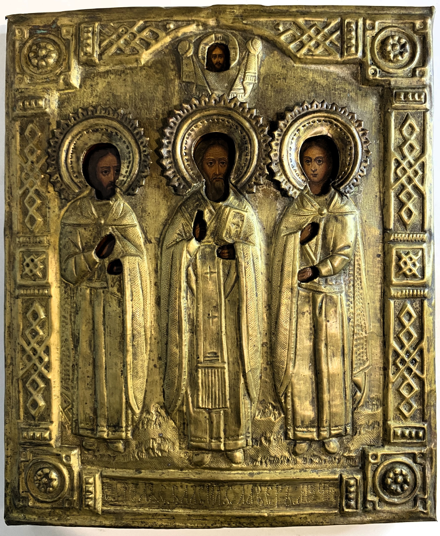 Старинная икона святые Флор Лавр Василий латунный оклад 19 век