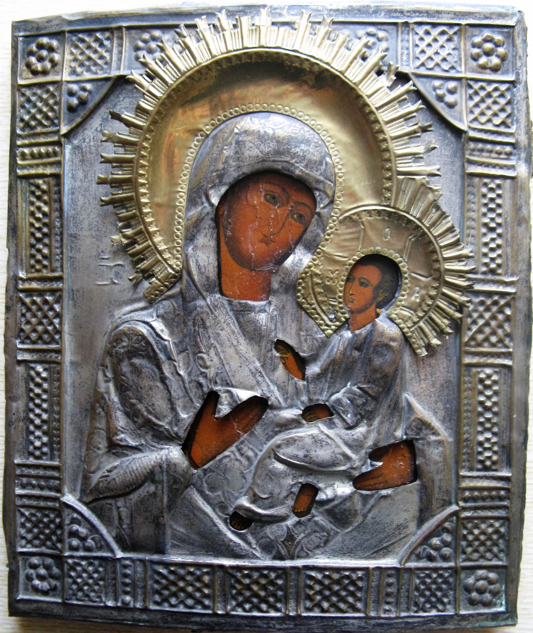 Икона Тихвинская Пресвятая Богородица в латунном кованом окладе 19 век